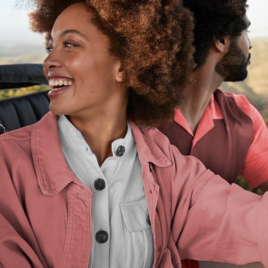 smiling couple on an adventure