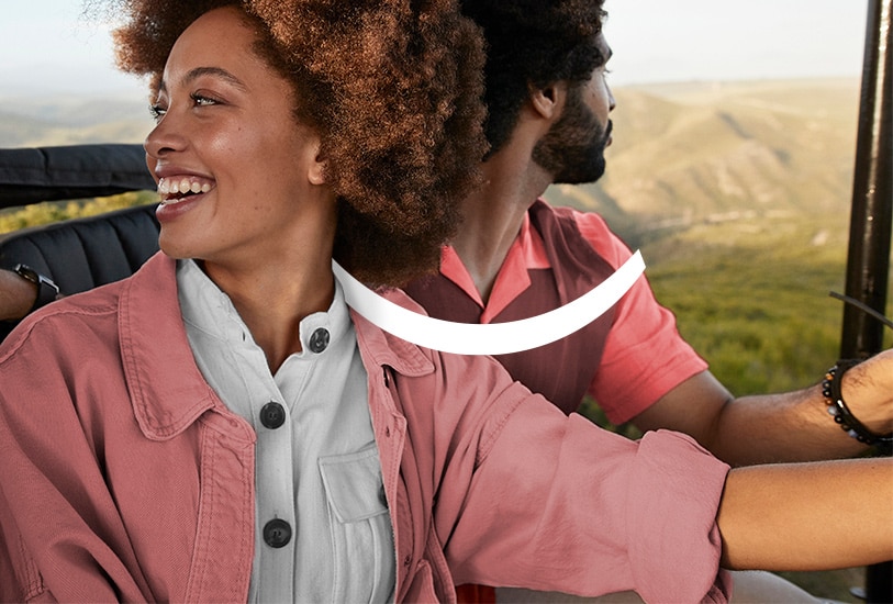 smiling couple on an adventure