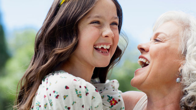 grandfather and grandson laughing