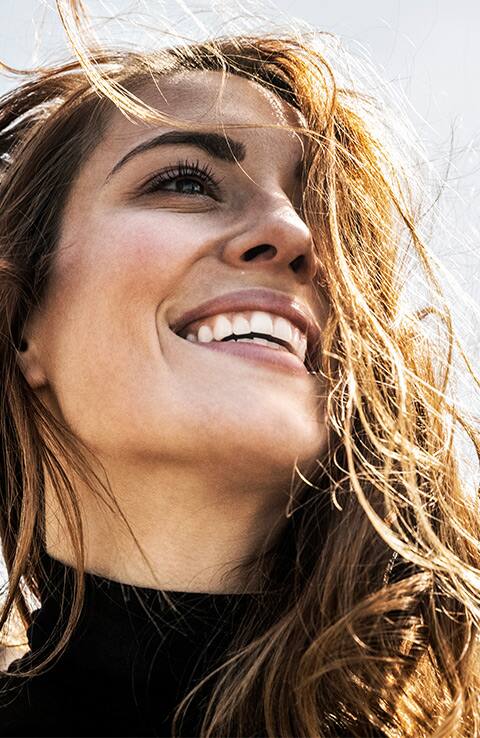 smiling woman showing white teeth smiling woman showing white teeth